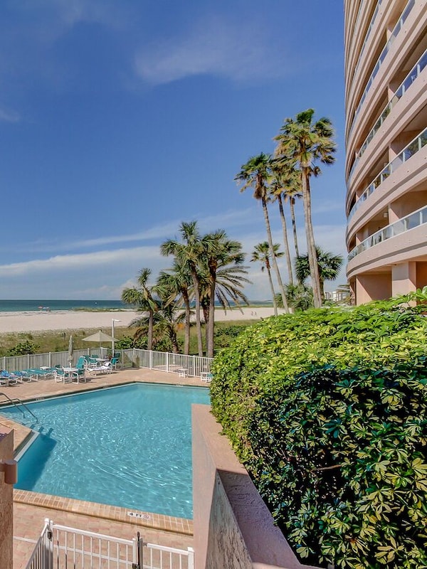 Steps to the pool, hot tub and beach.