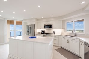 Newly remodeled, spacious kitchen! Fully stocked. Surrounded by water views.