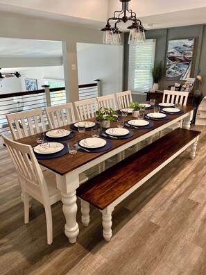 custom-built farmhouse dining table and bench that seats 12