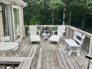 The deck overlooking the private yard.