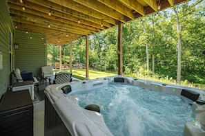 Hot tub with outdoor seating 