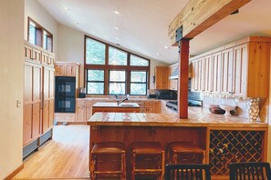 Fully equipped kitchen with incredible views and a breakfast bar
