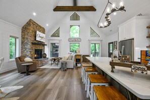 An open floor plan welcomes you as you enter.