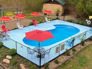 Enjoy the community pool and playground! (2 minute walk from cabin)