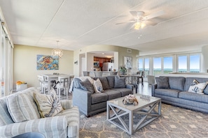 Living Area with Matching Sofa and Loveseat, 2 Comfortable Chairs and Flat Screen TV