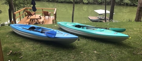 Explore the water with two kayaks and a canoe