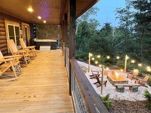Magical nights await you around the fire pit with lighting and ample seating. 