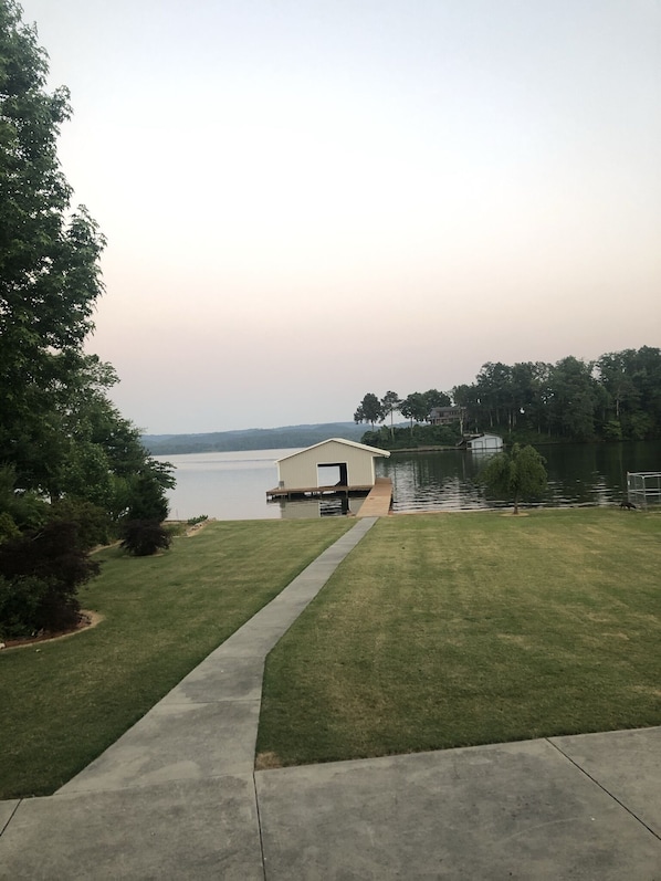 Looking  form porch across the yard to the Boathouse.