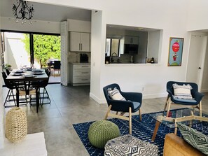 Living room leading to dining room and kitchen