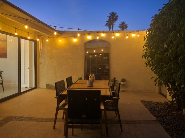Dining al fresco in your private courtyard complete w/ seating for 8 and new BBQ