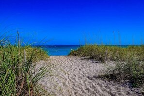 Make sure you bring flip flop for this amazing HOT walk on the sand over the dunes to the beach. But the pain is totally worth the beauty.   