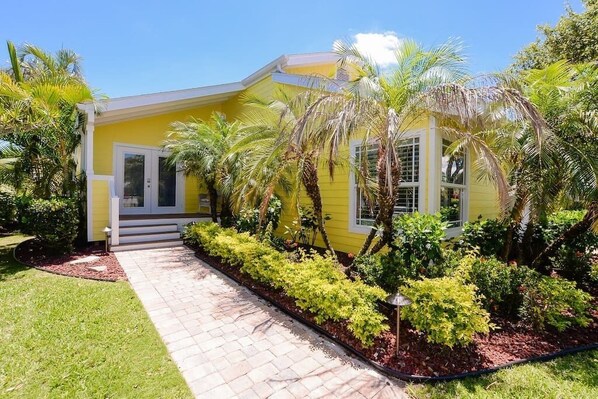 Completely renovated Island Style Beach house with in walking distance to the white sands  of Jensen Beach. Owner spared no expense making sure you will be amazed when you walk through the doors to this Tropical Paradise.
