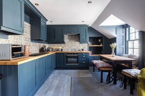 Open-plan kitchen with dining area