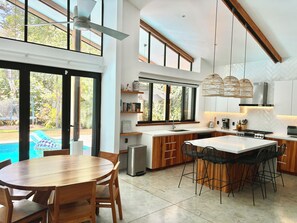 Indoor dining table and kitchen island.