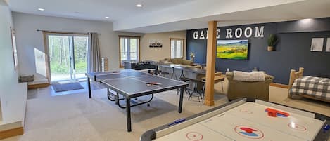 Basement game room, 75" smart tv, Ping Pong, foosball, air hockey,  dart board