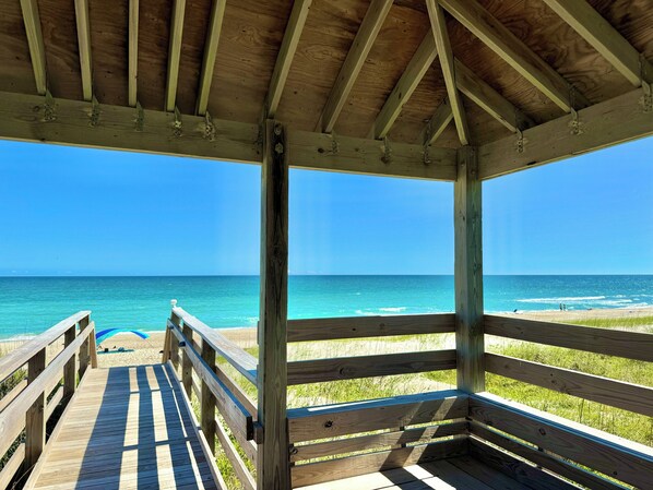 2 gazebos on property with seating to enjoy ocean views.
