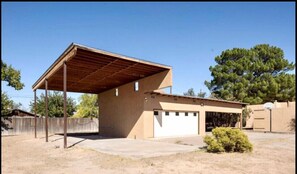 Garage, Car Port and RV parking with hookups.
