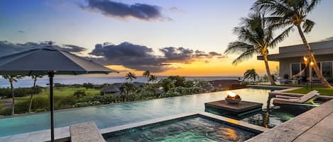 The Jacuzzi spa, set in the full-length infinity edge pool, is the perfect spot for a sunset cocktail