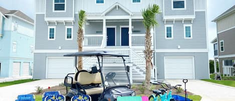 New golf cart, bicycles, extra beach chairs, wagon, cornhole, & morr
