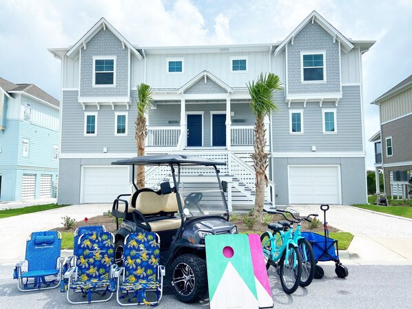 New golf cart, bicycles, extra beach chairs, wagon, cornhole, & morr
