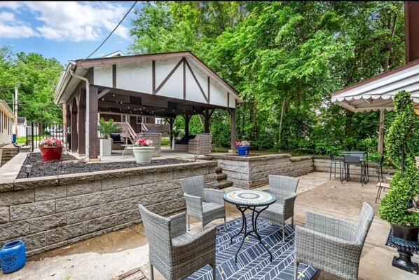 View from back house looking towards pavillion and the back deck on front home