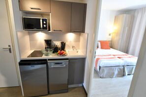Prepare a small meal in your kitchenette.
