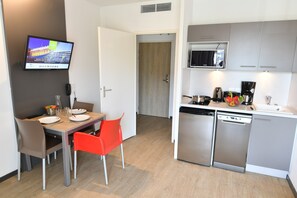 Settle into the dining area and enjoy a nice meal.