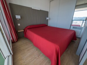 Relax on the comfy bed after a day outside.
