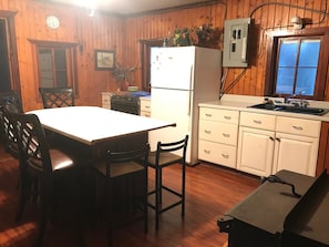 Eat-in kitchen with island that seats 6.