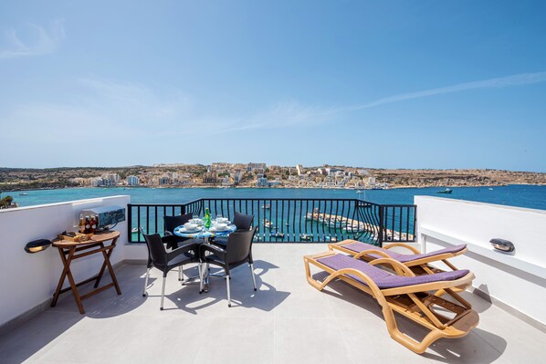 Sunny terrace with stunning panoramic sea views