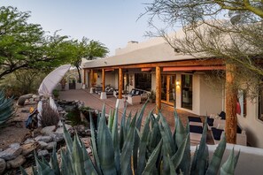 Private back patio complimented by Koi Pond