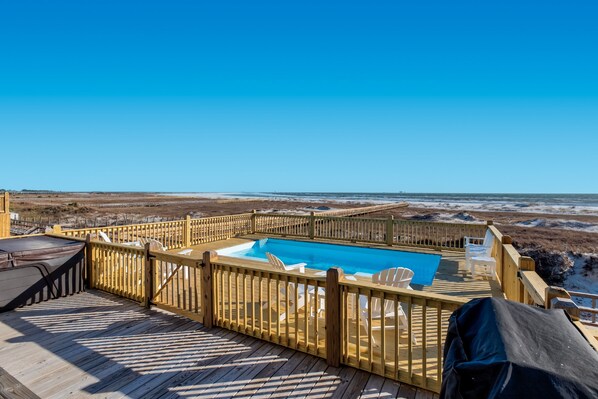 view of beach from pool area