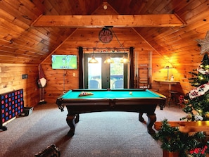 Relax and watch the game or your favorite movie in the loft/game room.