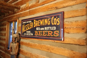 Vintage advertising and original artwork adorn the walls.