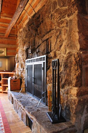 Stone fireplace is the heart of the Cabin