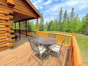 Cozy porch to sit and read a good book or enjoy morning coffee