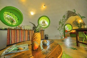 coffee table and fully equipped kitchen to cook delicious meals