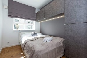 Cozy bedroom in the apartment. 