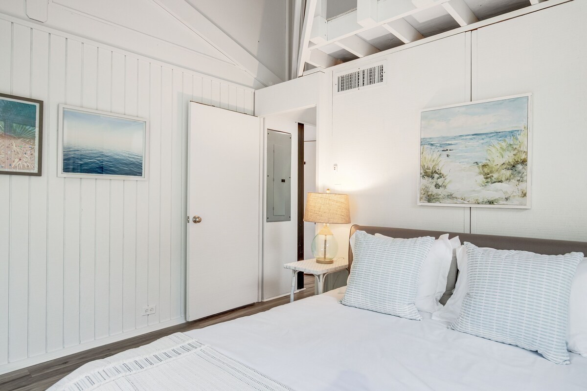 Lakefront home with lagoon view, deck & AC – close to beach, golf, & pools