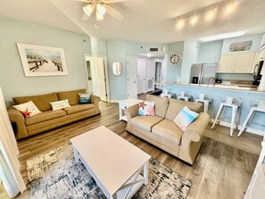 Relax in the spacious open living area with queen sleeper sofa