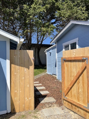 Fully fenced and gated backyard.