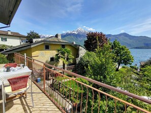 Sky, Cloud, Water, Plant, Property, Mountain, Building, Green, House, Tree