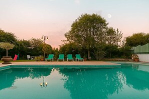Enjoy relaxing moments near the spacious swimming pool