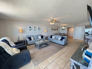Living Room features two reclining chairs and two queen sized sofa sleepers