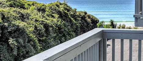 View of the beach from master bedroom balcony