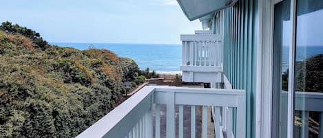 View of the beach from master bedroom balcony