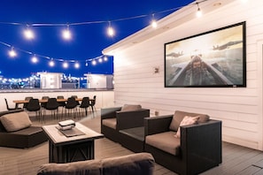Roof top views. Each unit has it's own rooftop deck with seating, views, movie projectors and grill