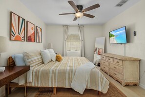 Master bedroom with a Kingsize bed.