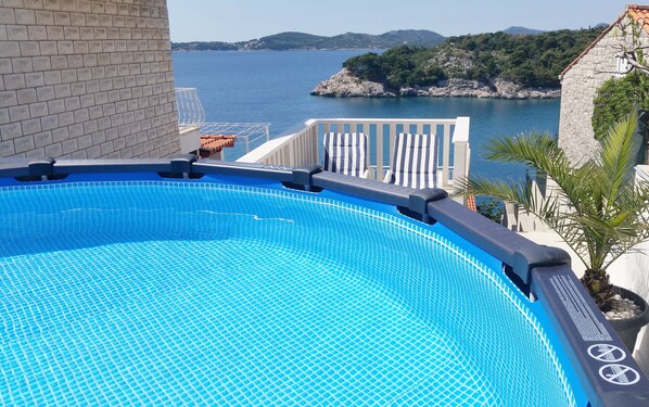 Outside pool, Sunbeds, Terrace