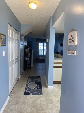 Entrance way as you enter the townhome, Kitchen to your right
